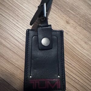 TUMI Black and Red Leather Luggage Tag